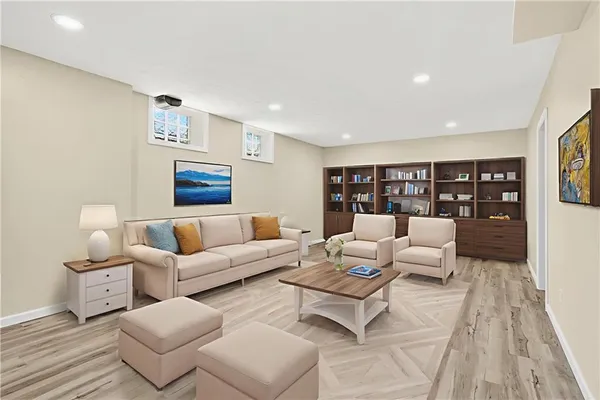 a living room with furniture and a table