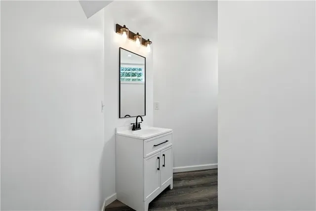 a bathroom with a toilet and a sink
