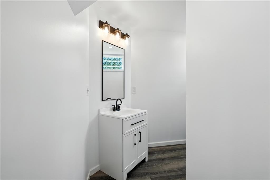 545 Vanderbilt Road Connellsville, PA 15425 - Photo 45 of 49 a bathroom with a toilet and a sink