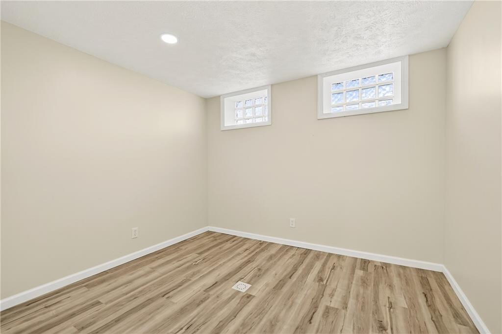 545 Vanderbilt Road Connellsville, PA 15425 - Photo 49 of 49 a view of a room with wooden floor