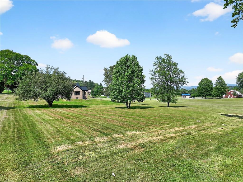 545 Vanderbilt Road Connellsville, PA 15425 - Photo 6 of 49 a view of a golf course with a trees