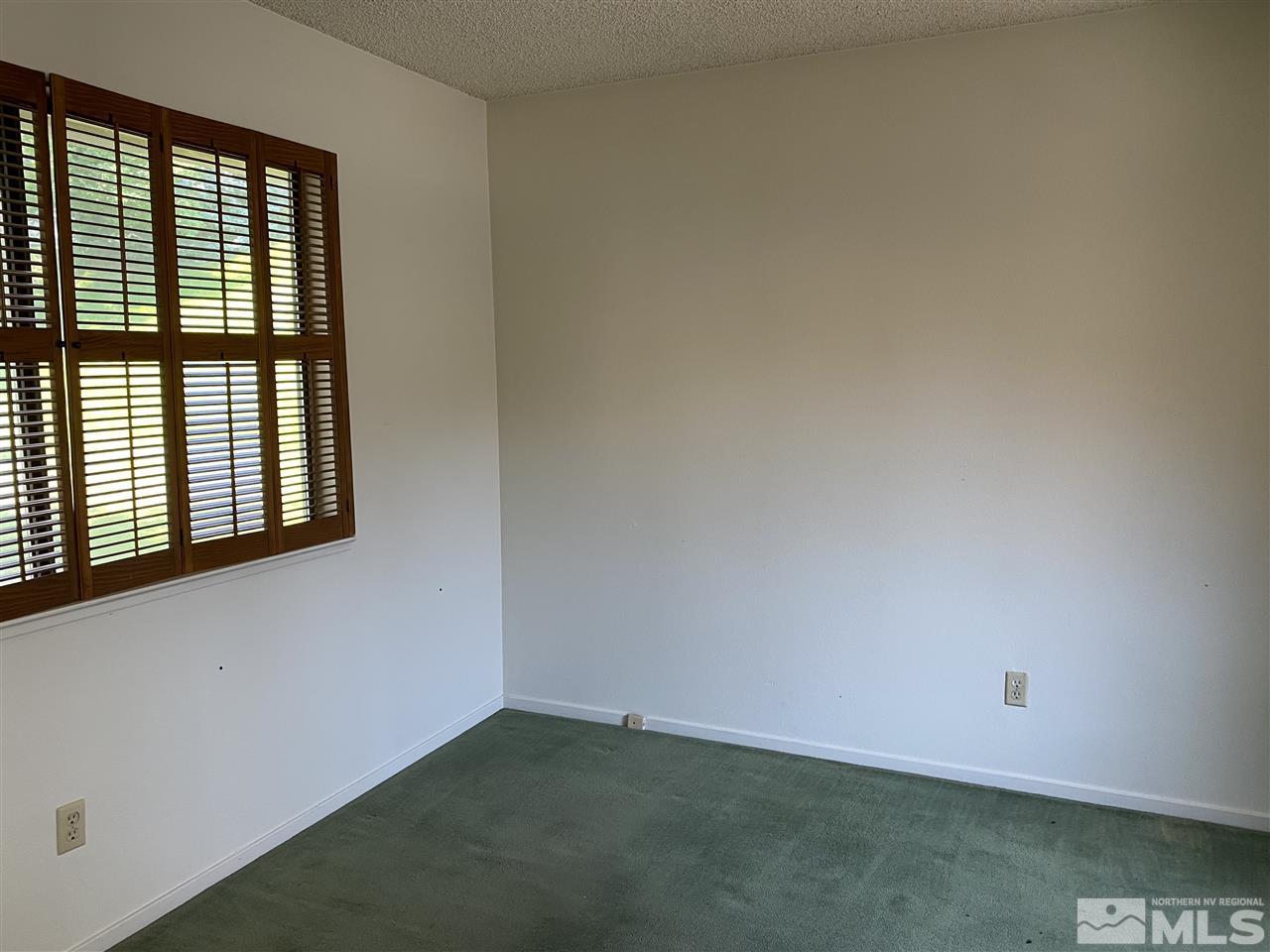 1207 Searchlite Court Reno, NV 89503 - Photo 11 of 17 an empty room with a window