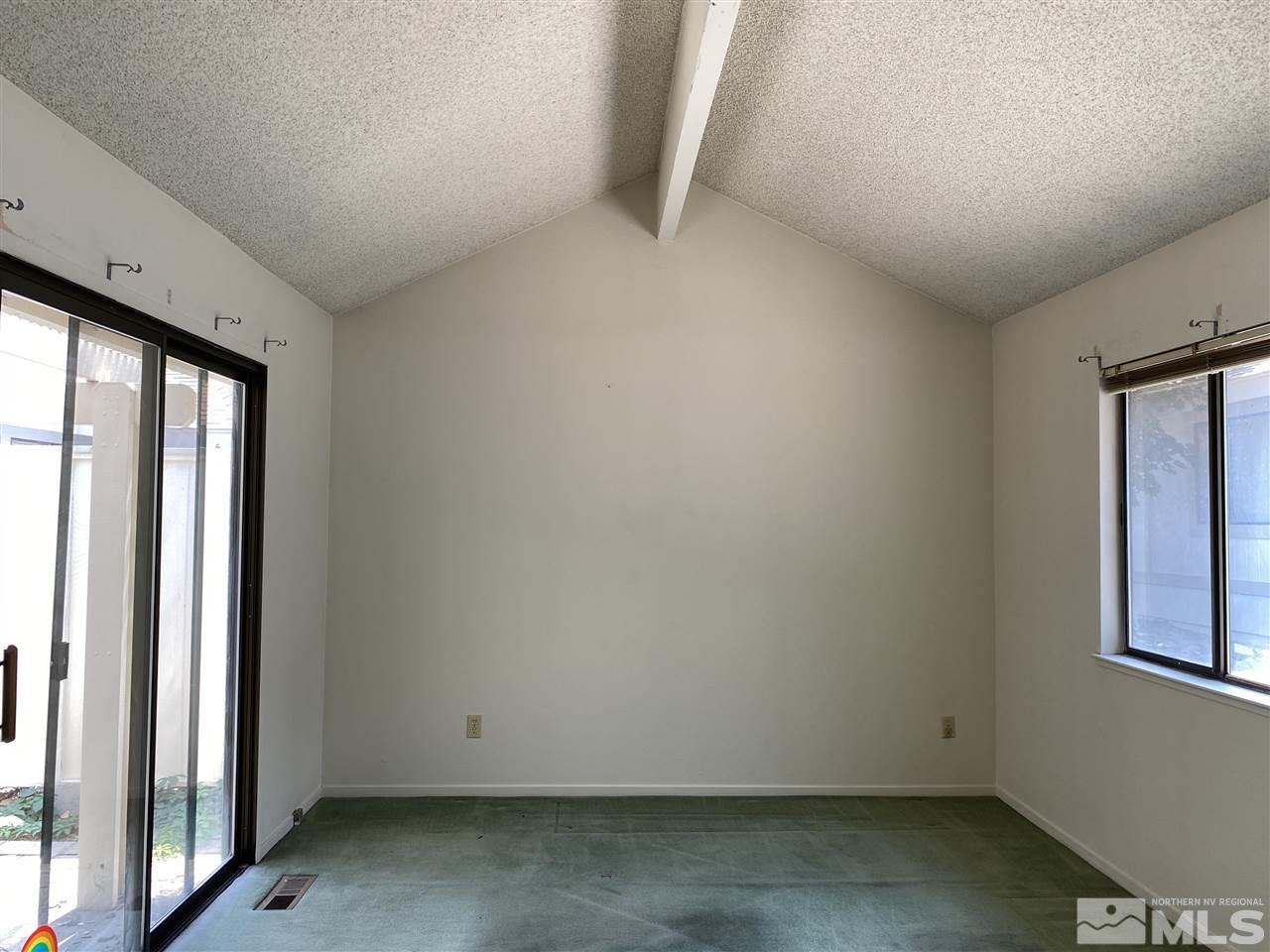 1207 Searchlite Court Reno, NV 89503 - Photo 12 of 17 an empty room with windows