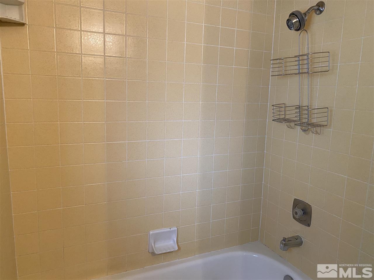 1207 Searchlite Court Reno, NV 89503 - Photo 14 of 17 a bathroom with a shower