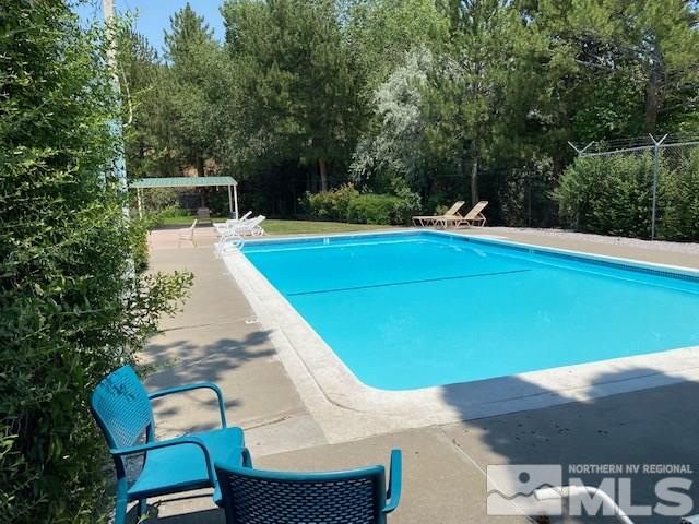 1207 Searchlite Court Reno, NV 89503 - Photo 5 of 17 a view of a chairs in a patio