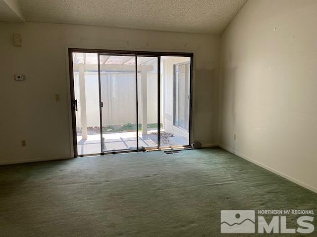 1207 Searchlite Court Reno, NV 89503 - Photo 10 of 17 an empty room with large window