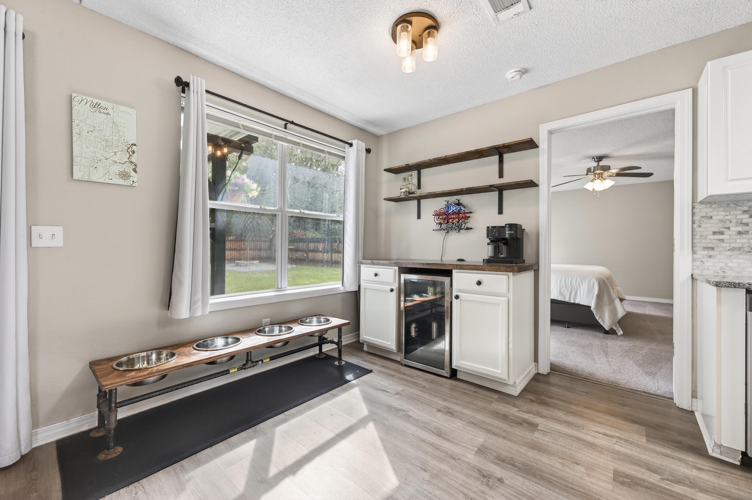 4331 Crosswind Drive Milton, FL 32583 - Photo 13 of 50 a kitchen that has a sink and a stove