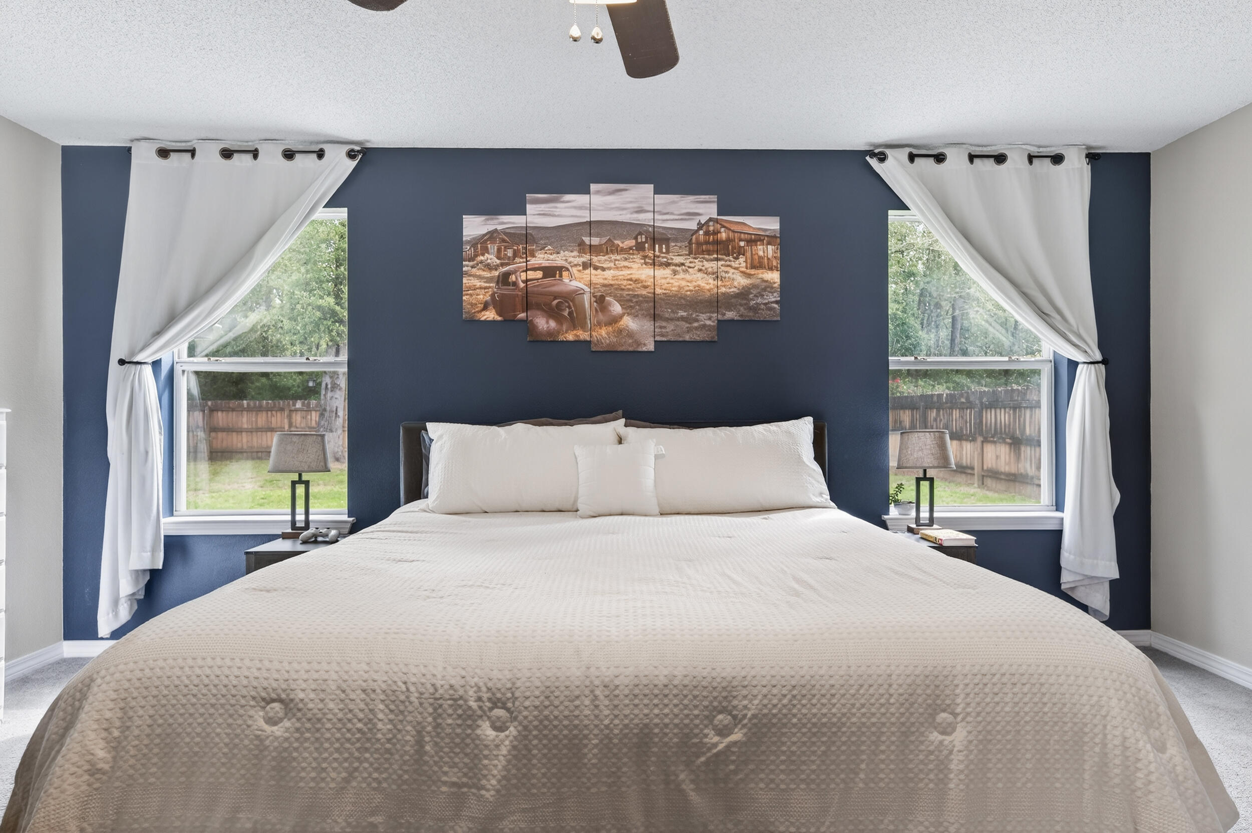 4331 Crosswind Drive Milton, FL 32583 - Photo 26 of 50 a large bed sitting in a bedroom next to a window