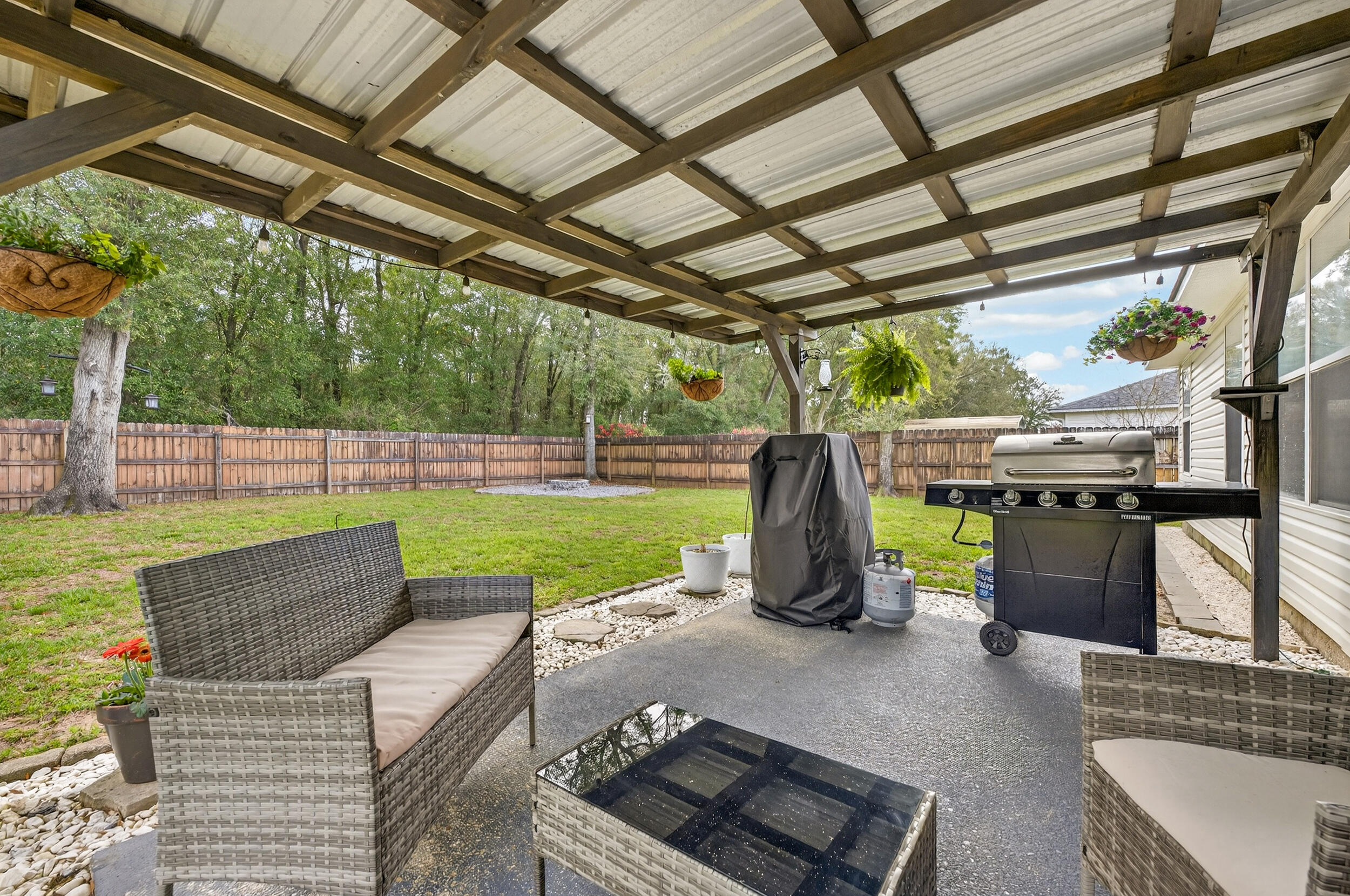 4331 Crosswind Drive Milton, FL 32583 - Photo 38 of 50 a view of backyard with swimming pool
