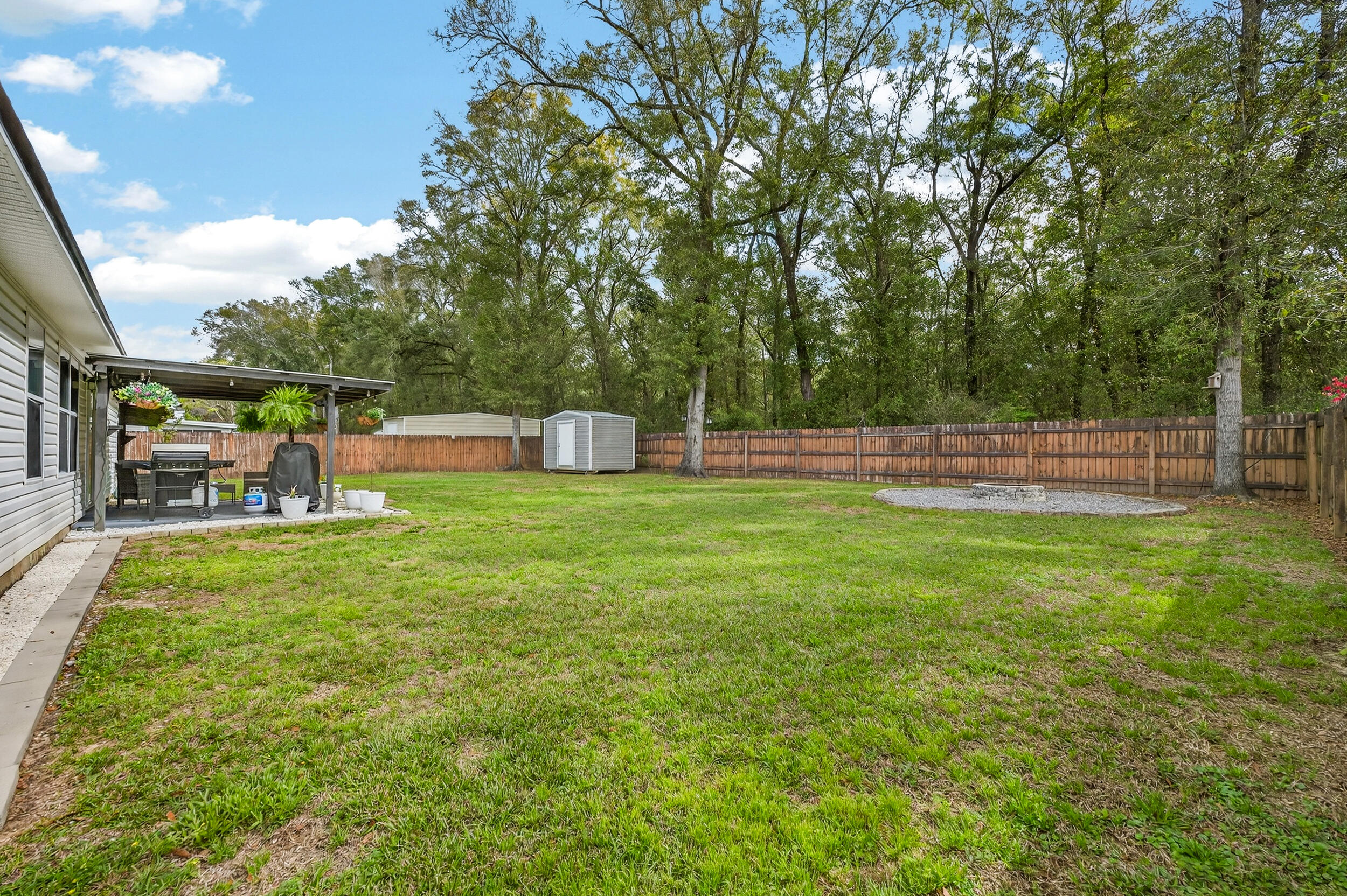 4331 Crosswind Drive Milton, FL 32583 - Photo 41 of 50 a view of yard with green space