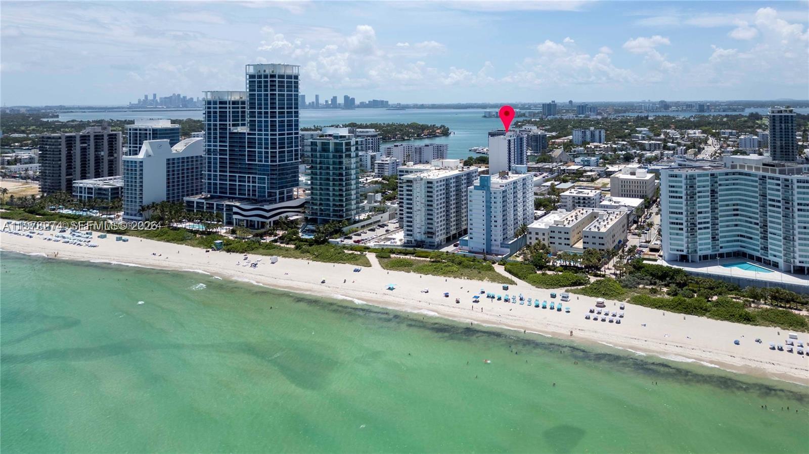 401 69th Street, Unit 913 Miami Beach, FL 33141 - Photo 19 of 26 a city view with tall buildings