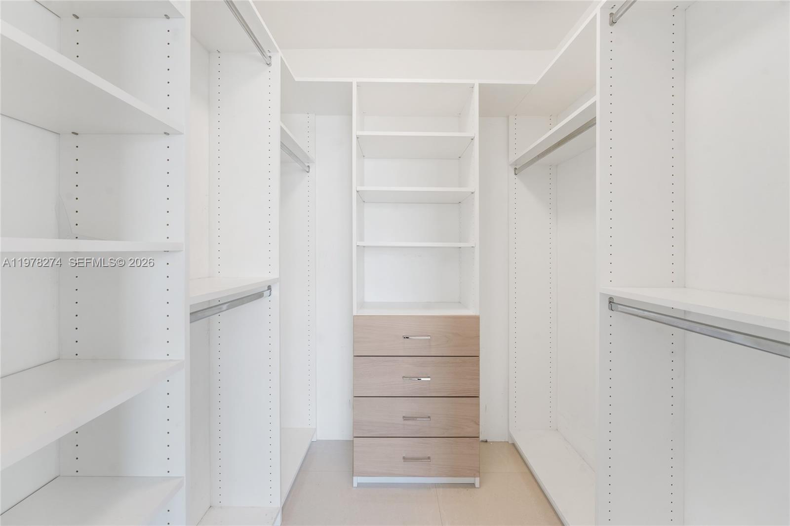 401 69th Street, Unit 913 Miami Beach, FL 33141 - Photo 6 of 26 a view of walk in closet