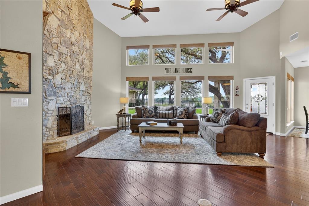 8877 Random Road Fort Worth, TX 76179 - Photo 6 of 40 a living room with furniture and a fireplace