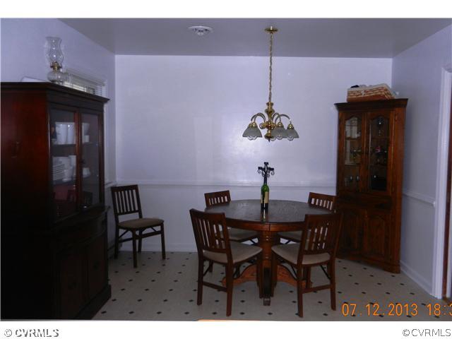 7320 Hopkins Road North Chesterfield, VA 23237 - Photo 5 of 13 a dining room with furniture and wooden floor