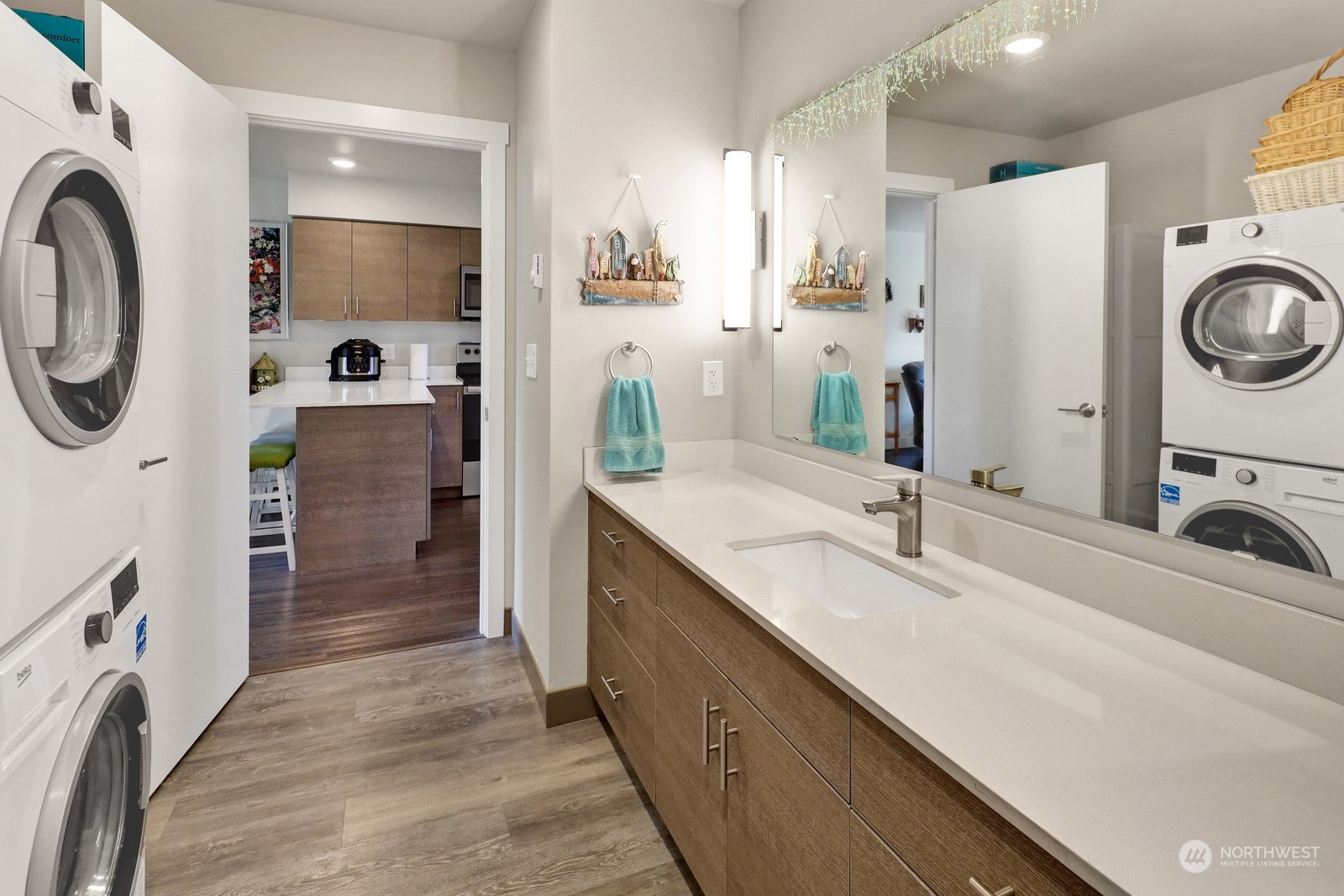 1882 Front Street, Unit 111 Lynden, WA 98264 - Photo 19 of 29 a bathroom with a sink double vanity and a mirror