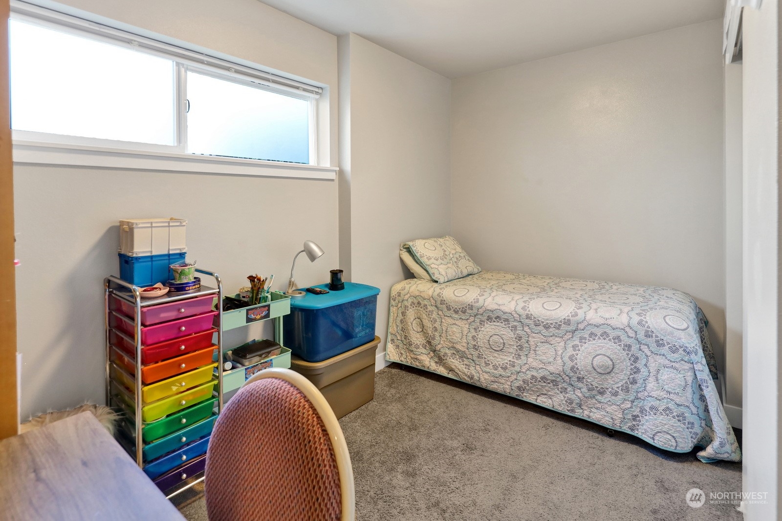 1882 Front Street, Unit 111 Lynden, WA 98264 - Photo 21 of 29 a bedroom with a bed and a window
