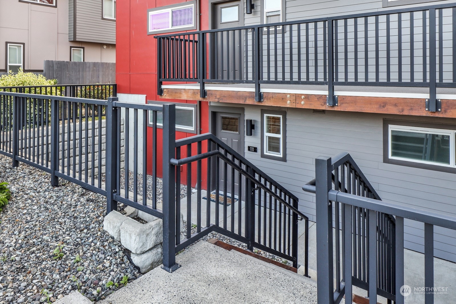 1882 Front Street, Unit 111 Lynden, WA 98264 - Photo 29 of 29 a view of a balcony with wooden fence