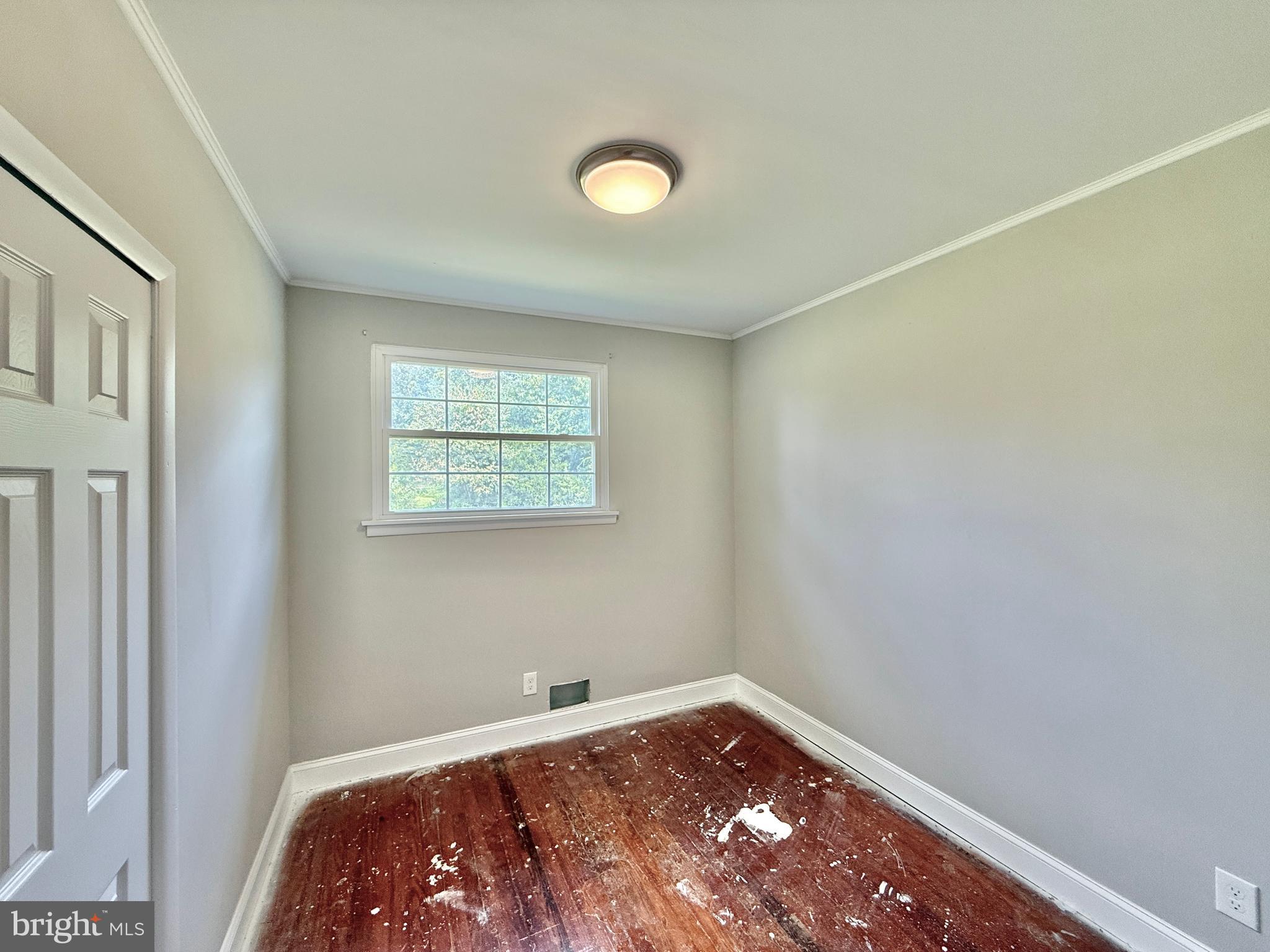 1097 Dutch Mill Road Newfield, NJ 08344 - Photo 13 of 23 a view of a bedroom with a bed and a window