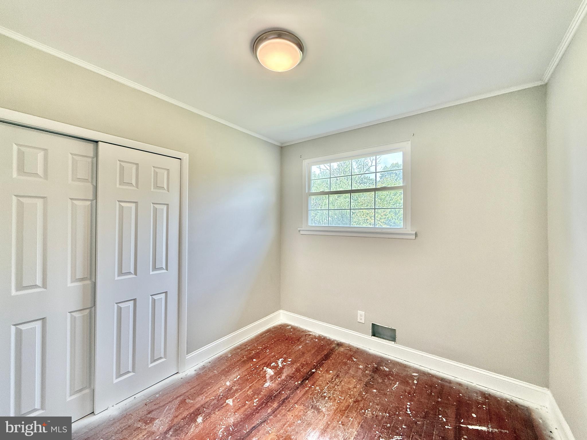 1097 Dutch Mill Road Newfield, NJ 08344 - Photo 14 of 23 an empty room with windows