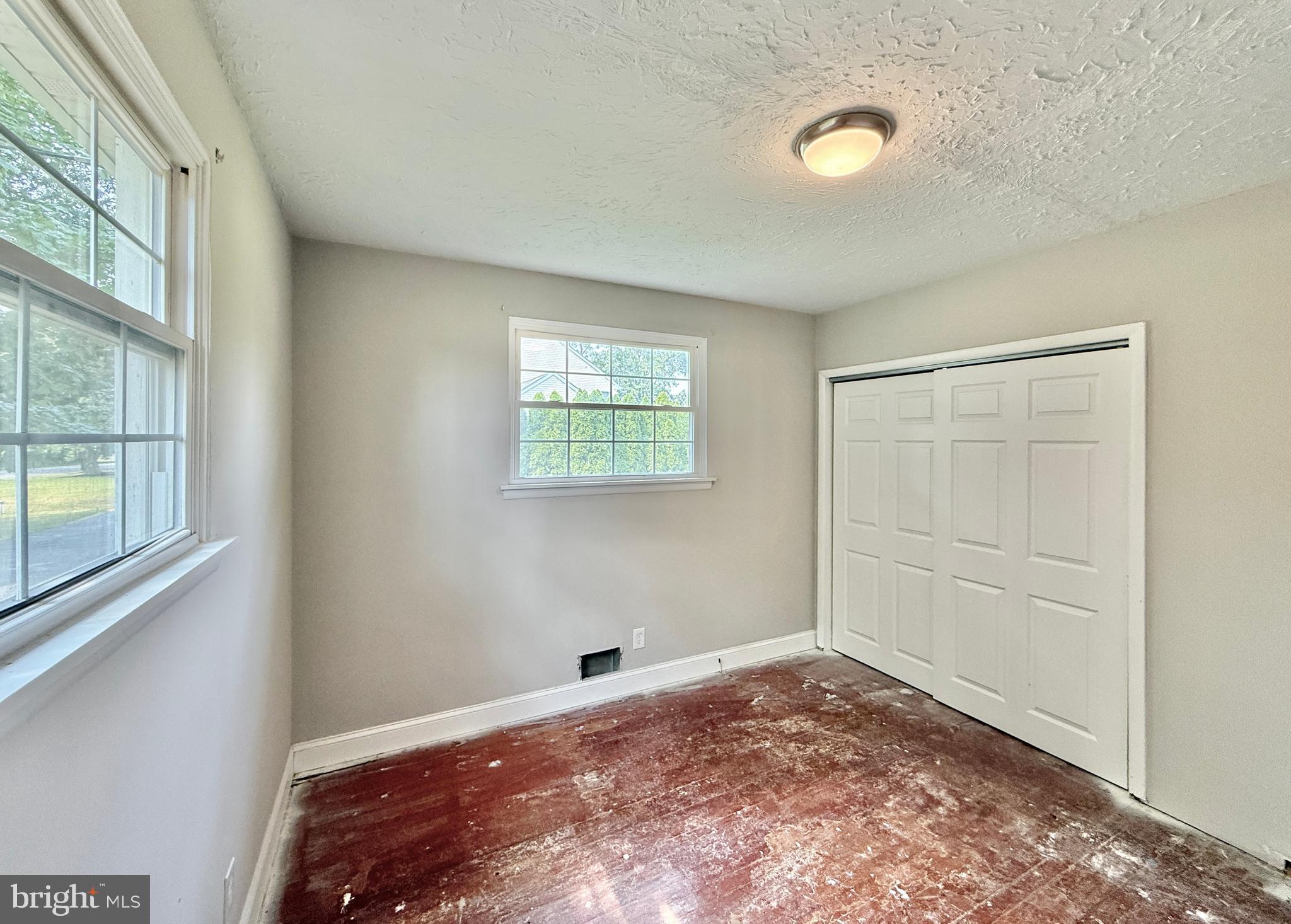 1097 Dutch Mill Road Newfield, NJ 08344 - Photo 18 of 23 an empty room with windows