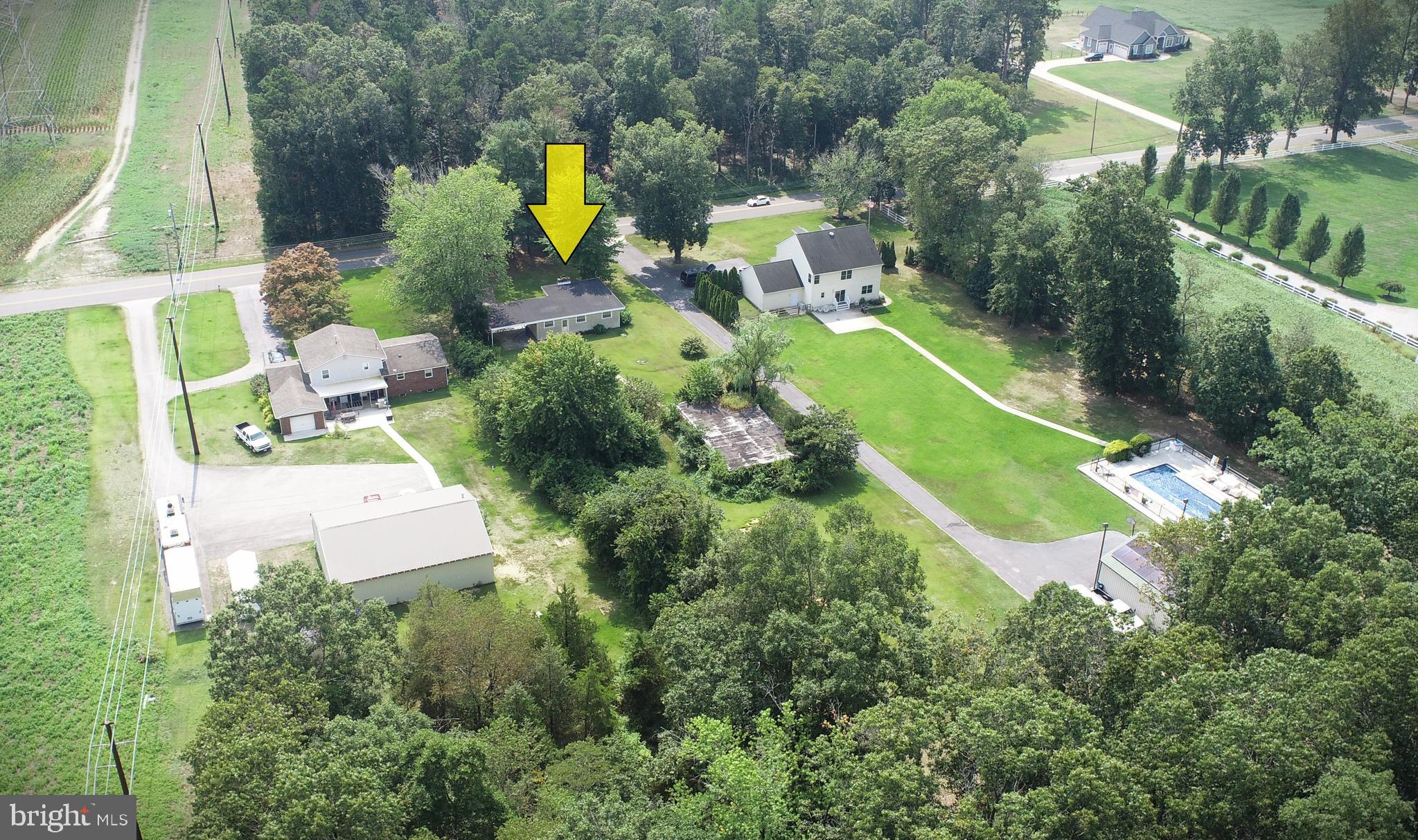 1097 Dutch Mill Road Newfield, NJ 08344 - Photo 4 of 23 an aerial view of a house with a swimming pool