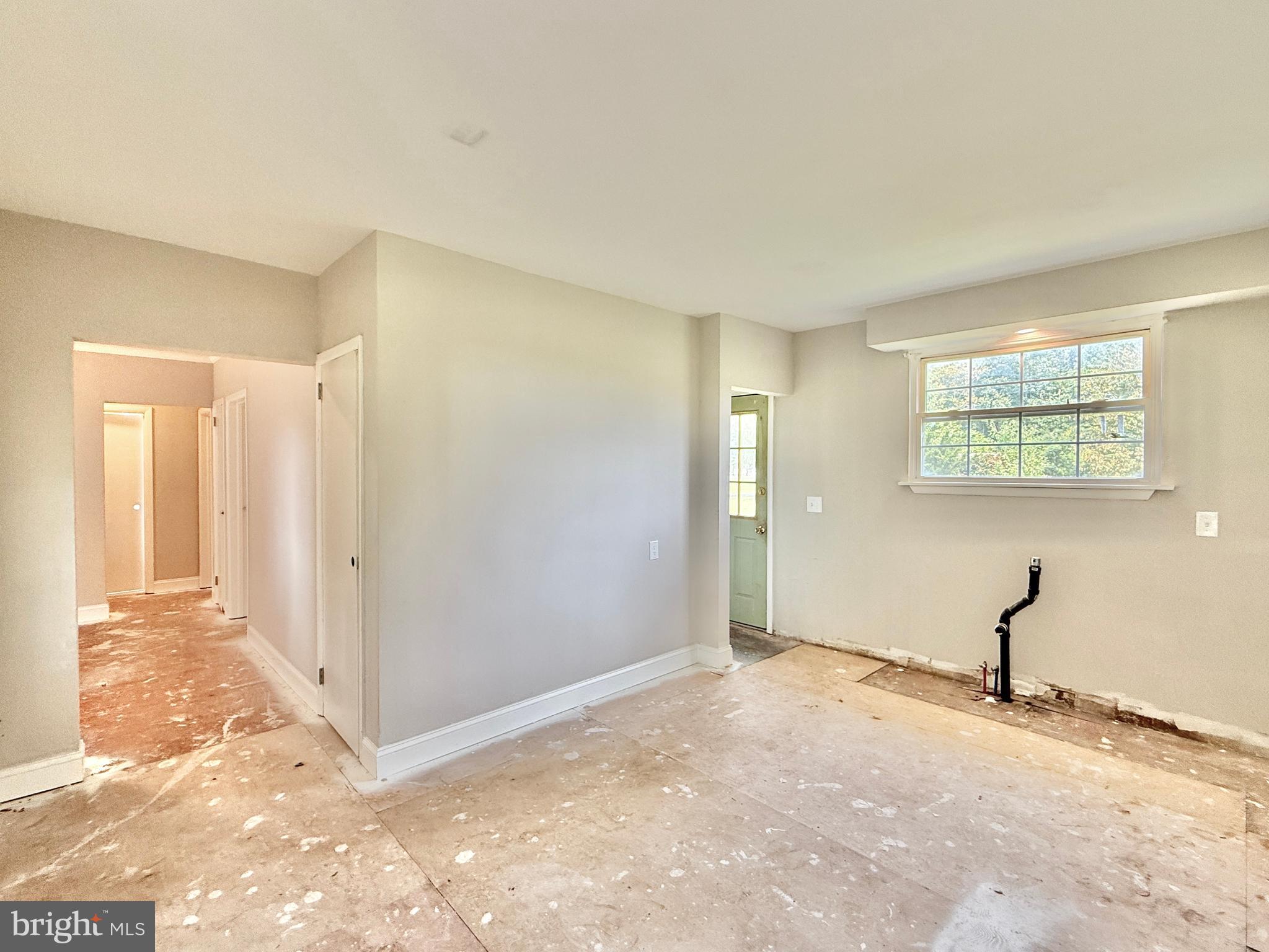 1097 Dutch Mill Road Newfield, NJ 08344 - Photo 10 of 23 a view of a livingroom with wooden floor and a bathroom