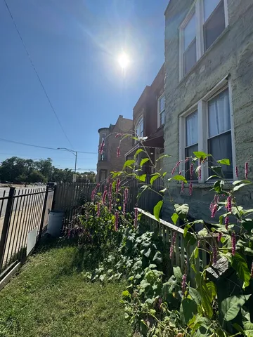 a backyard of a house with lots of green space