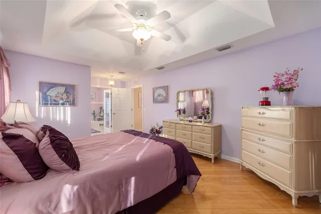 a bathroom with a bathtub a sink and a window