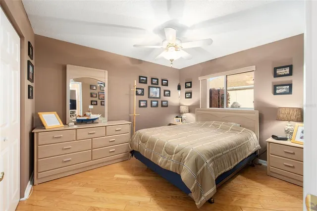 a en suite bathroom with a double vanity sink a mirror and a bathtub