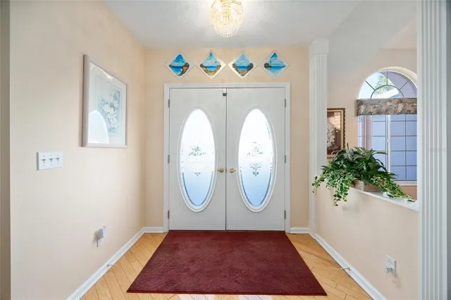 a view of entryway with wooden floor