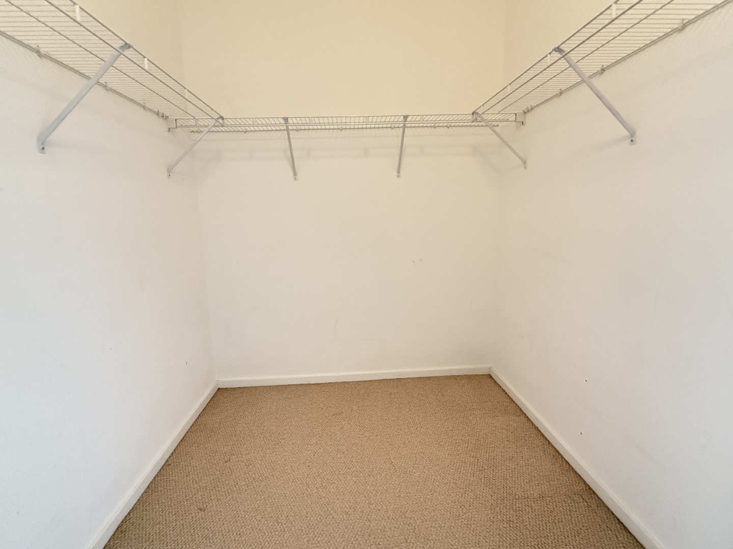 2323 West Pershing Road, Unit 421 Chicago, IL 60609 - Photo 8 of 15 a view of a room with racks on the wall