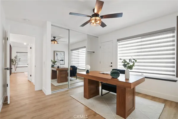 a workspace with furniture and window