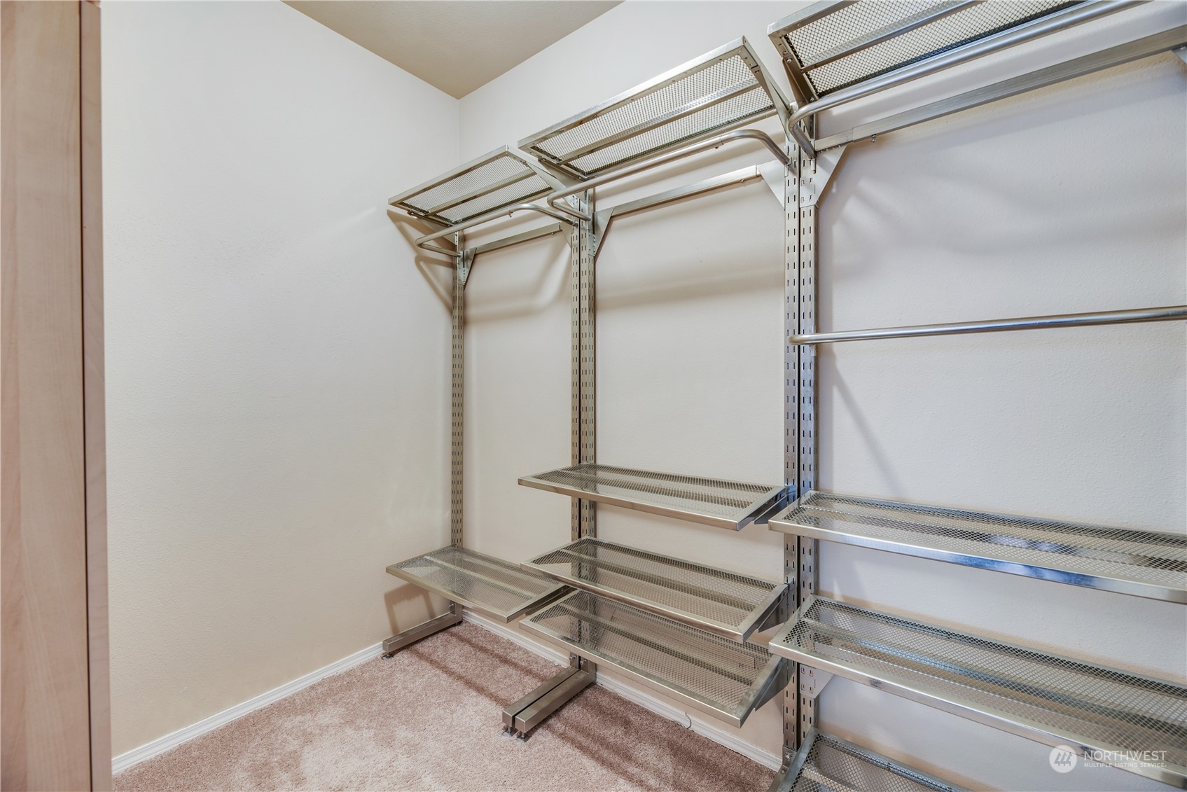 17604 134th Lane Southeast, Unit 17604 Renton, WA 98058 - Photo 11 of 25 a view of an empty room