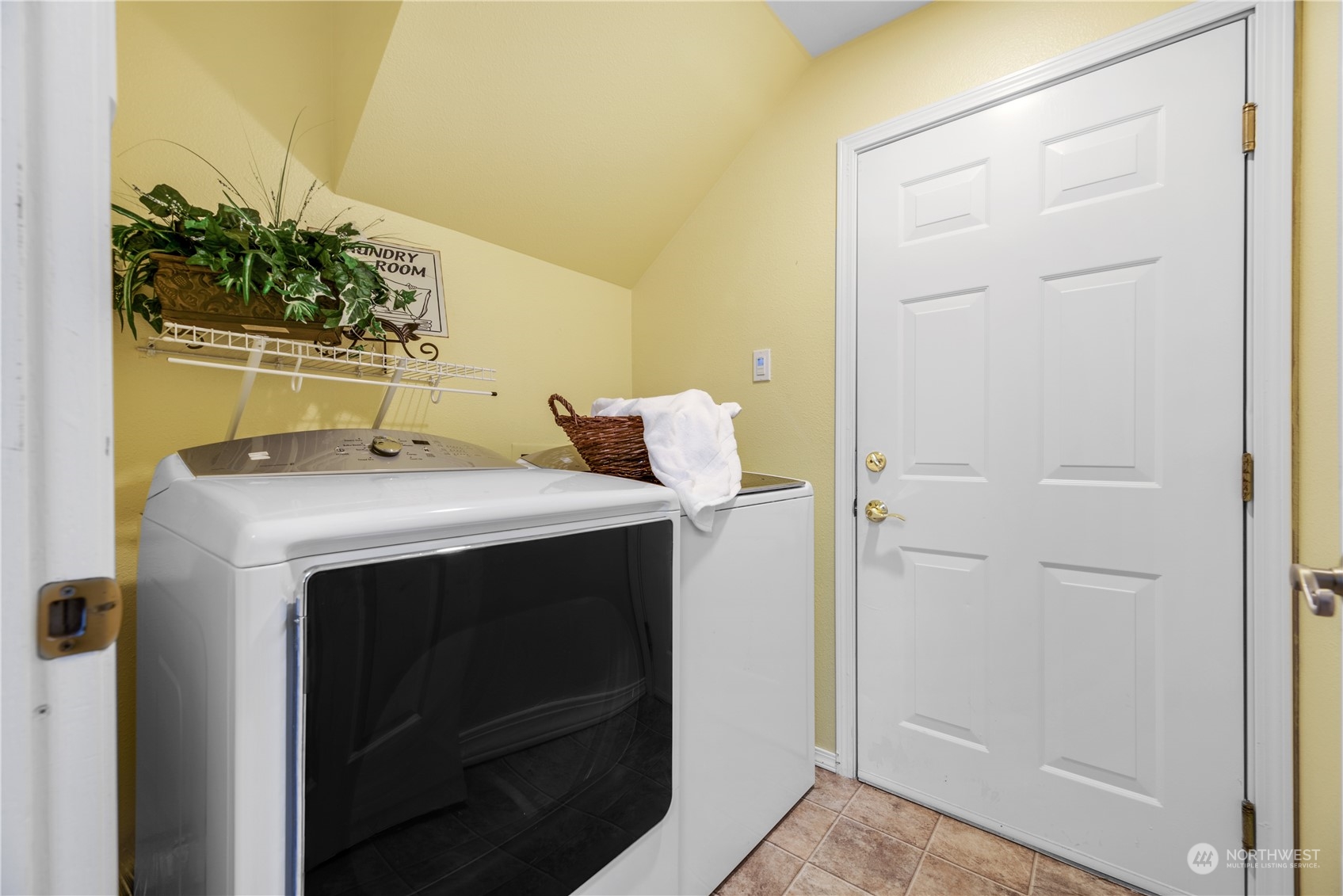 17604 134th Lane Southeast, Unit 17604 Renton, WA 98058 - Photo 16 of 25 a utility room with dryer and washer