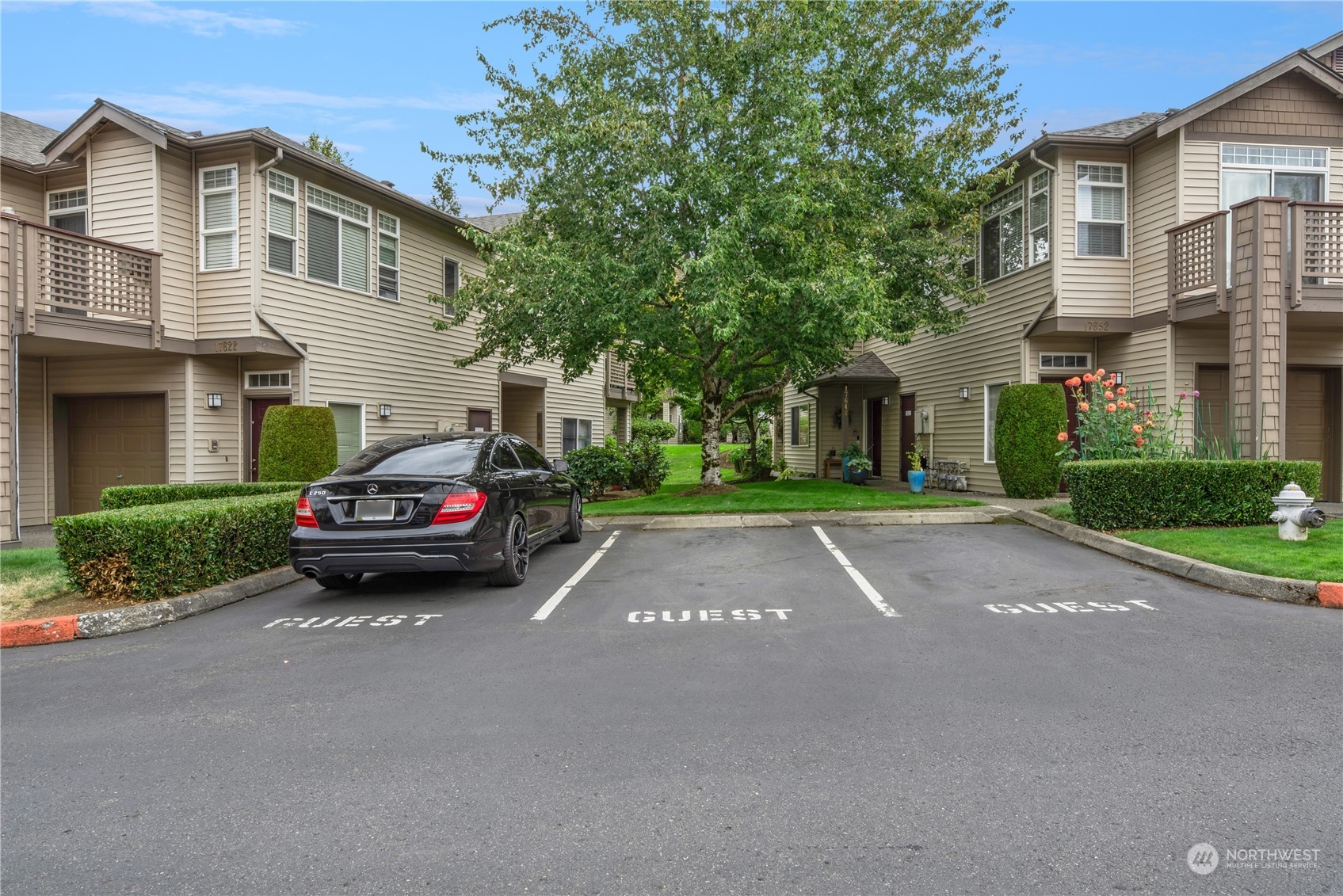 17604 134th Lane Southeast, Unit 17604 Renton, WA 98058 - Photo 19 of 25 a view of street with parked cars