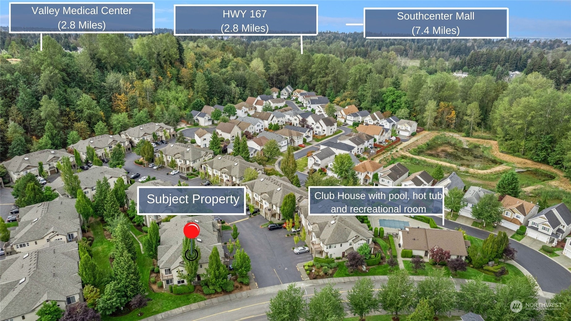 17604 134th Lane Southeast, Unit 17604 Renton, WA 98058 - Photo 23 of 25 a sign that is sitting in front of flowers