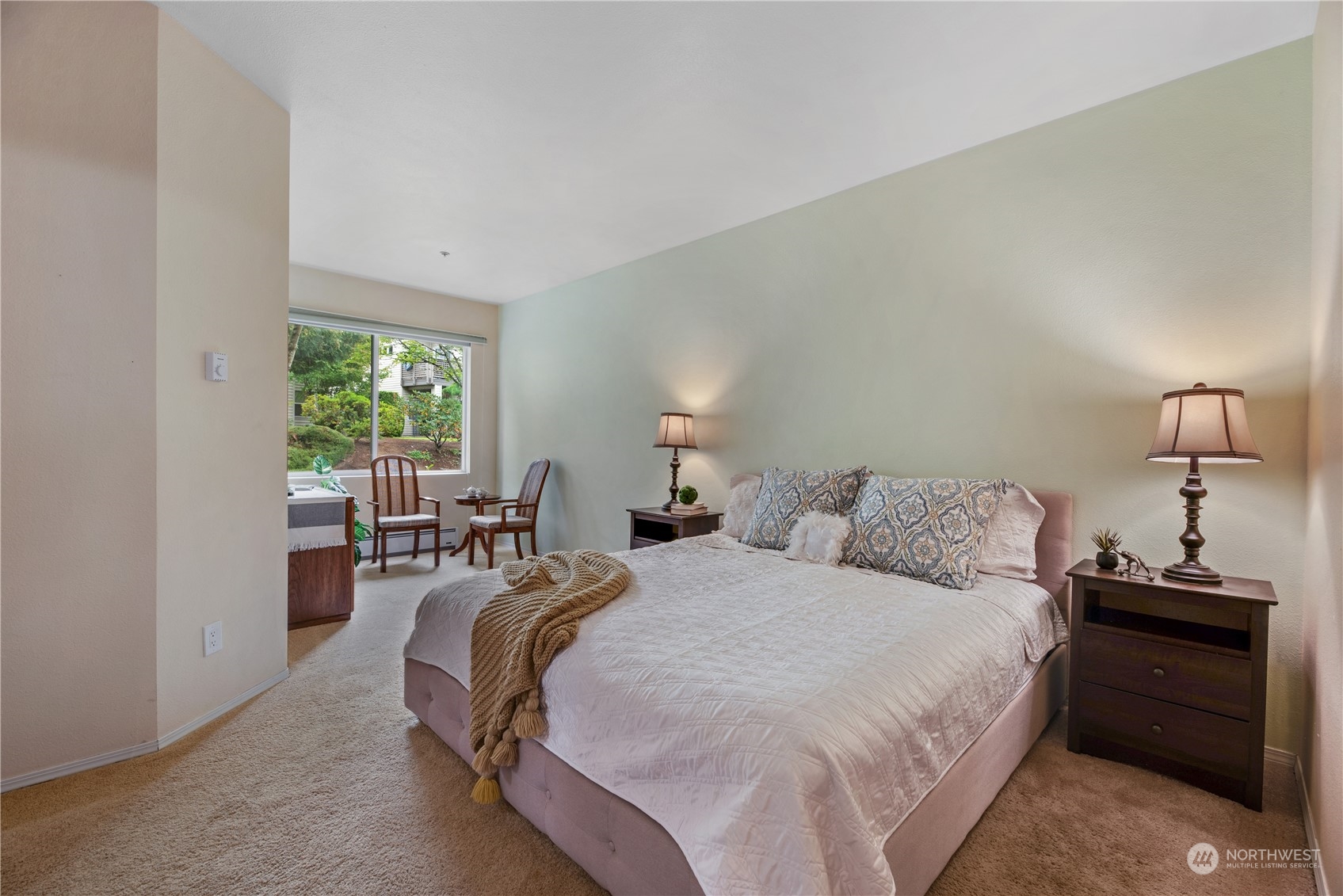 17604 134th Lane Southeast, Unit 17604 Renton, WA 98058 - Photo 10 of 25 a bedroom with a bed and a window