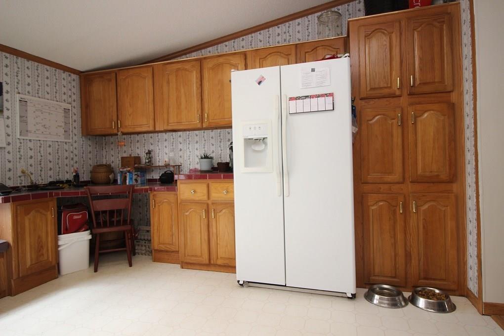 1020 Mullen Road Stetson, ME 04488 - Photo 5 of 34 A lot of pantry cabinets and a...