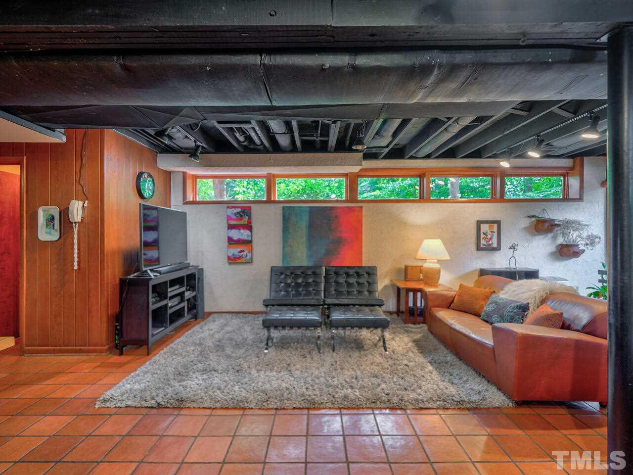 4512 Bartlett Street Raleigh, NC 27609 - Photo 16 of 30 Large open room on lower level of the home