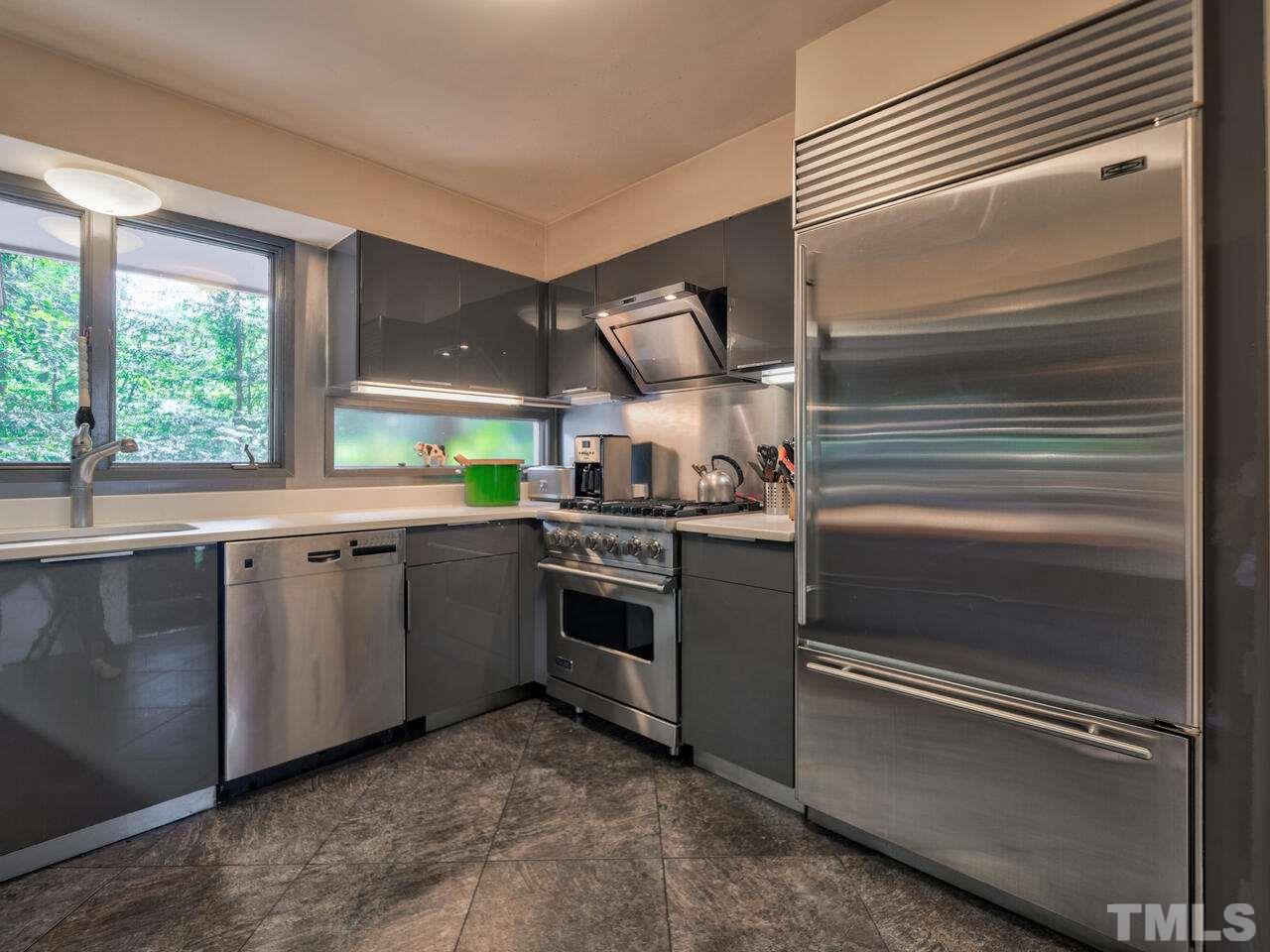 4512 Bartlett Street Raleigh, NC 27609 - Photo 10 of 30 Wolf range and Sub-Zero refrigerator