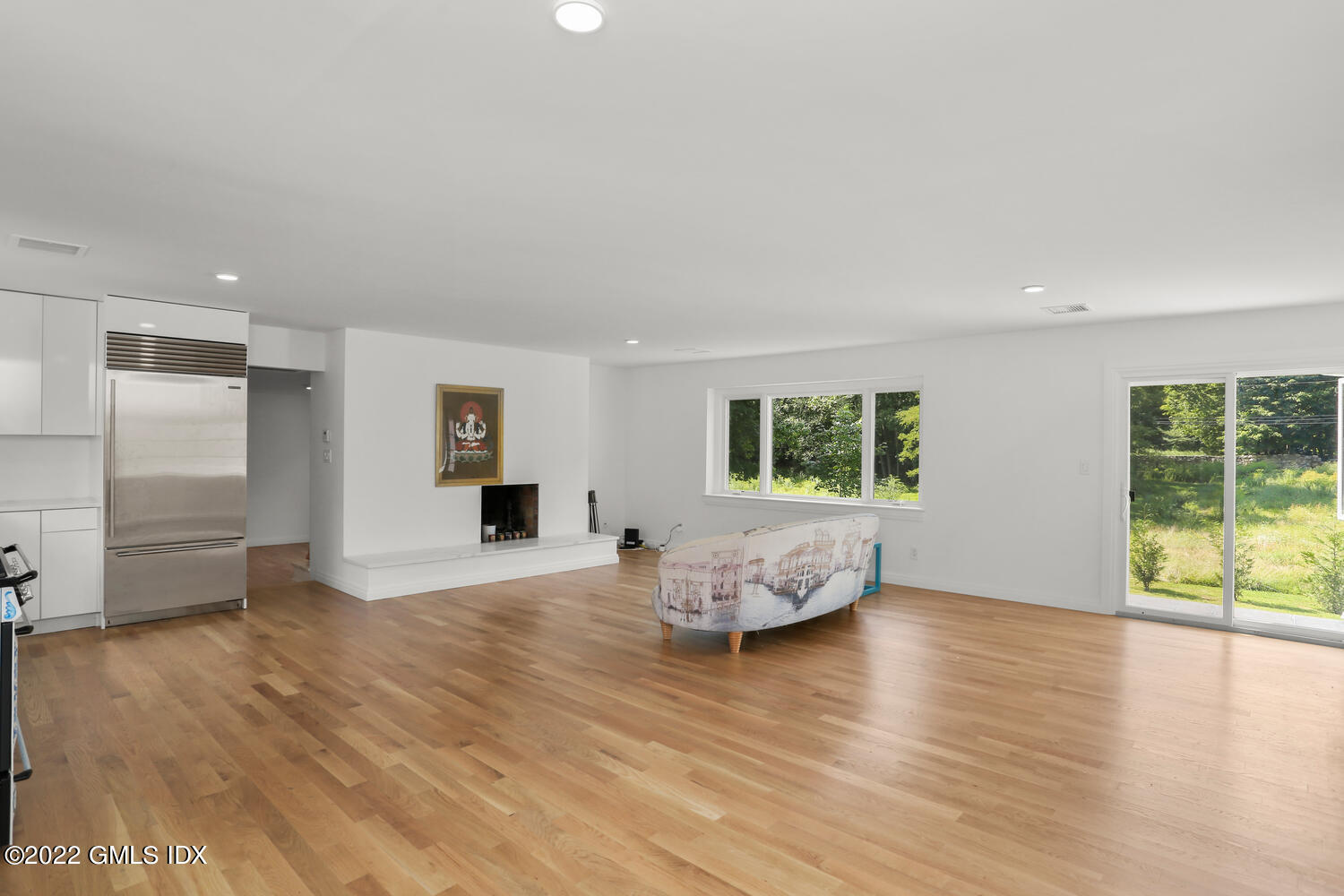 609 Round Hill Road Greenwich, CT 06831 - Photo 12 of 25 a view of a livingroom with furniture window and wooden floor