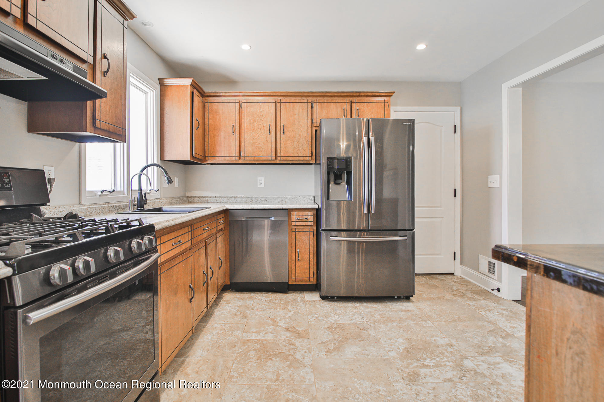 525 Frank Applegate Road Jackson, NJ 08527 - Photo 15 of 56 a kitchen with stainless steel appliances granite countertop a stove a refrigerator and a sink