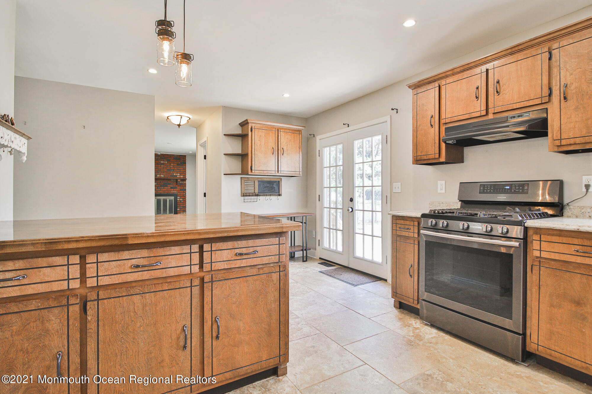 525 Frank Applegate Road Jackson, NJ 08527 - Photo 16 of 56 a kitchen with stainless steel appliances granite countertop a stove a sink and a microwave