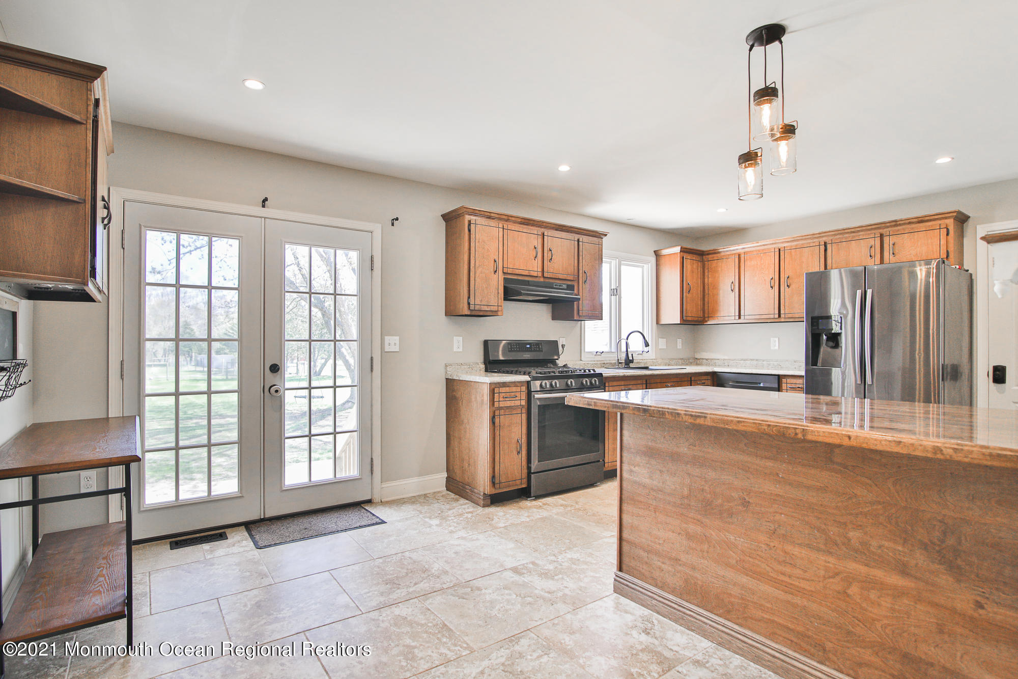 525 Frank Applegate Road Jackson, NJ 08527 - Photo 18 of 56 a large kitchen with kitchen island granite countertop a large window and a sink
