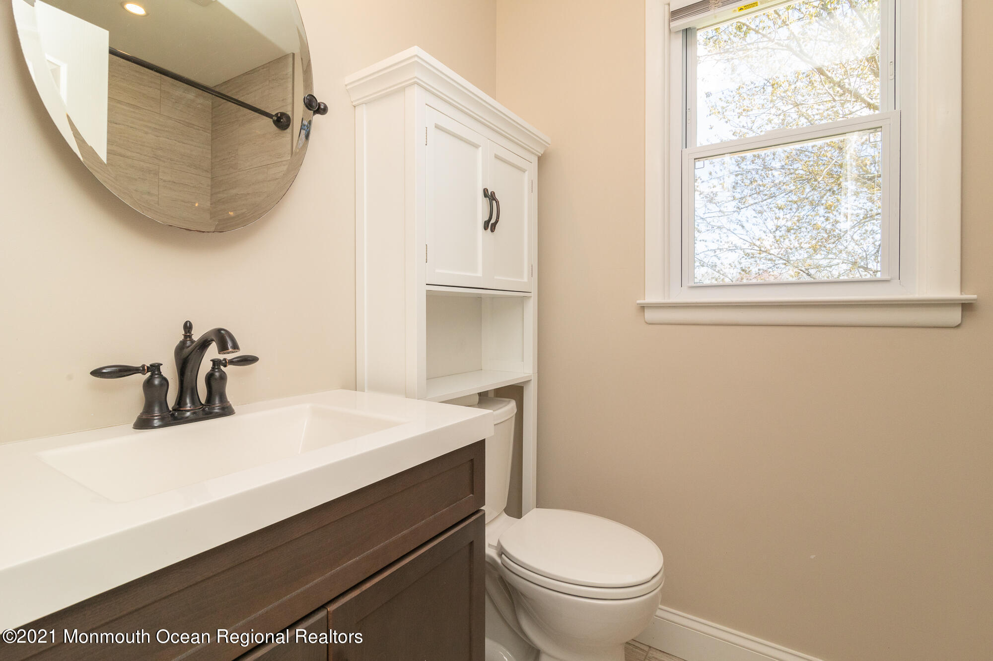 525 Frank Applegate Road Jackson, NJ 08527 - Photo 36 of 56 a bathroom with a sink a toilet and a mirror