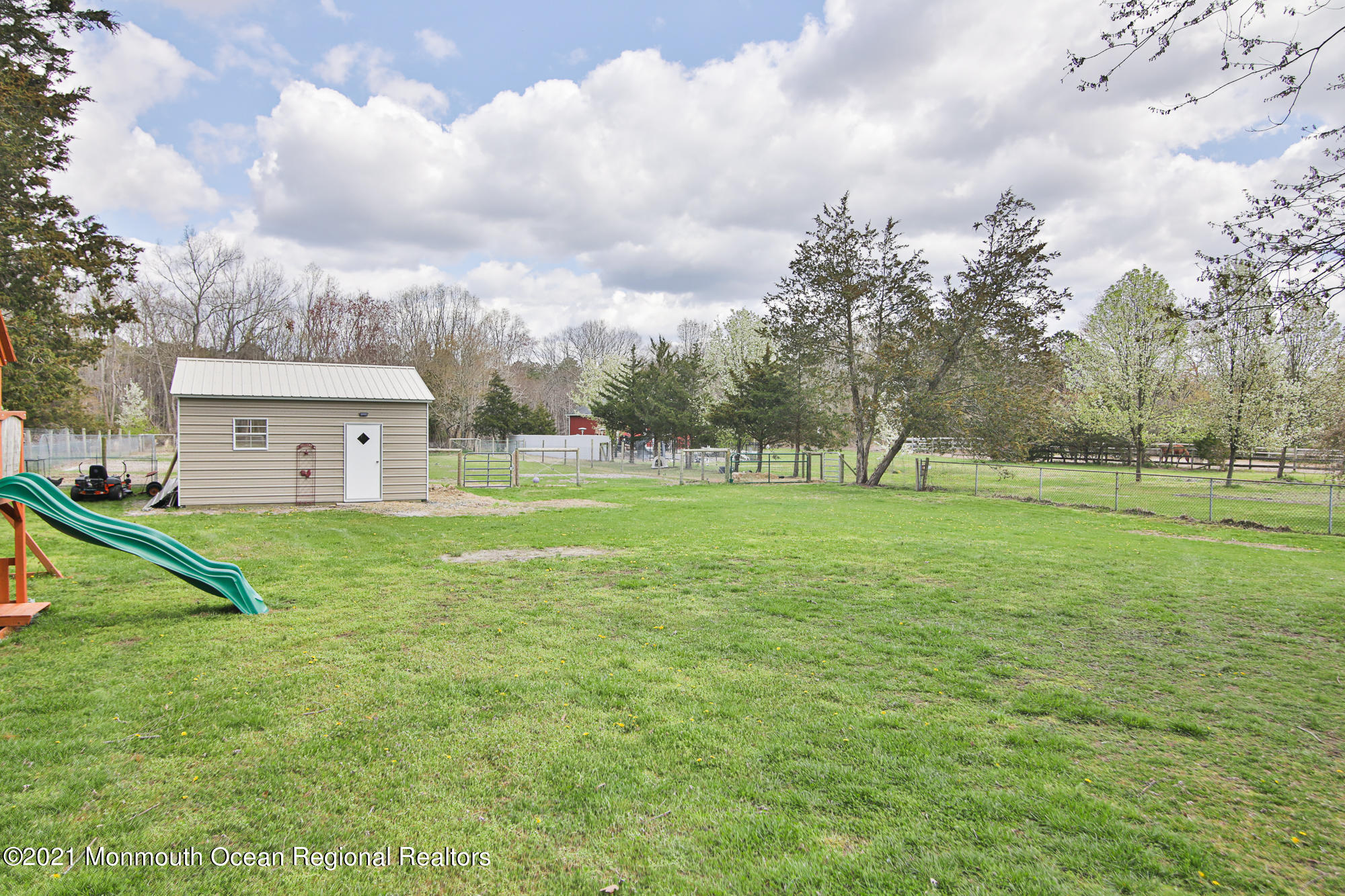 525 Frank Applegate Road Jackson, NJ 08527 - Photo 46 of 56 a view of a house with a big yard and a large tree
