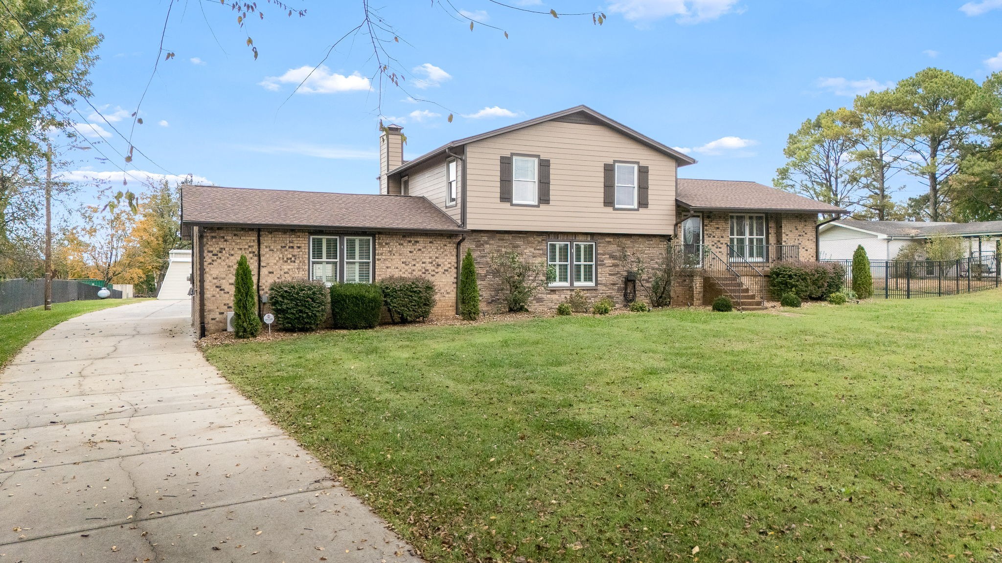6580 Burkitt Road Antioch, TN 37013 - Photo 1 of 62 a view of a yard in front of a house
