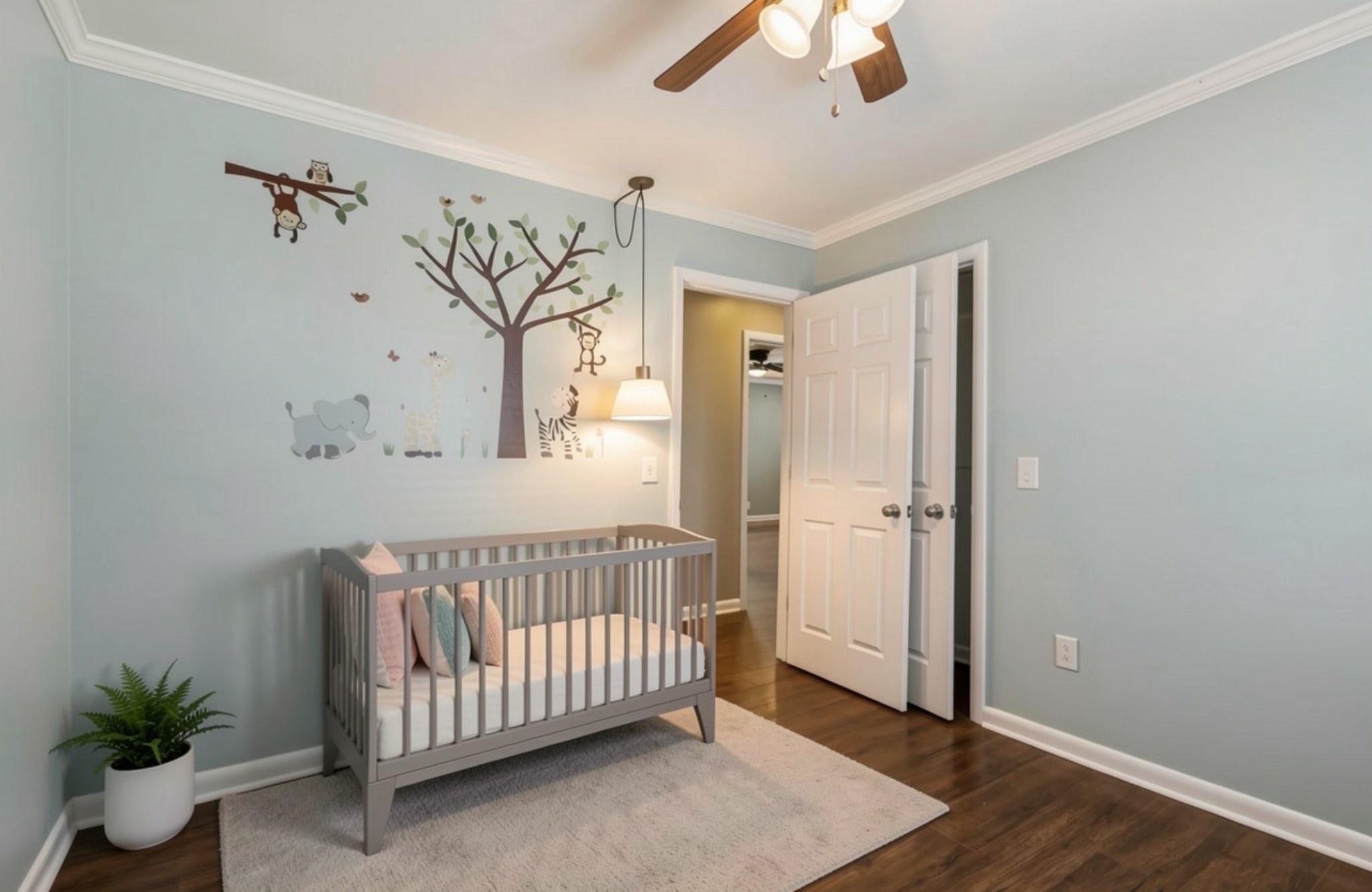 6580 Burkitt Road Antioch, TN 37013 - Photo 16 of 62 a view of a porch with a potted plant and wooden floor