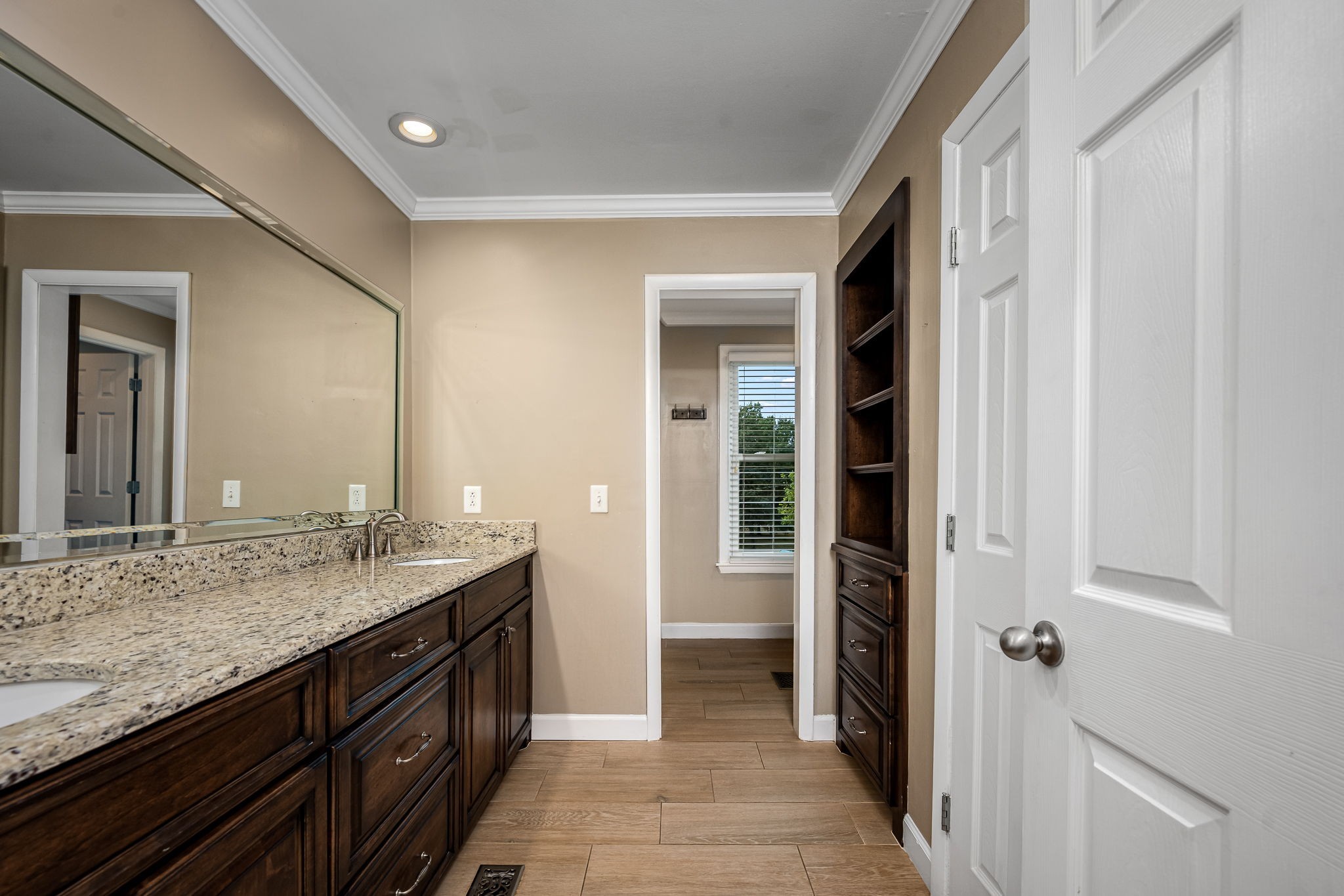 6580 Burkitt Road Antioch, TN 37013 - Photo 22 of 62 a bathroom with a granite countertop sink and a mirror
