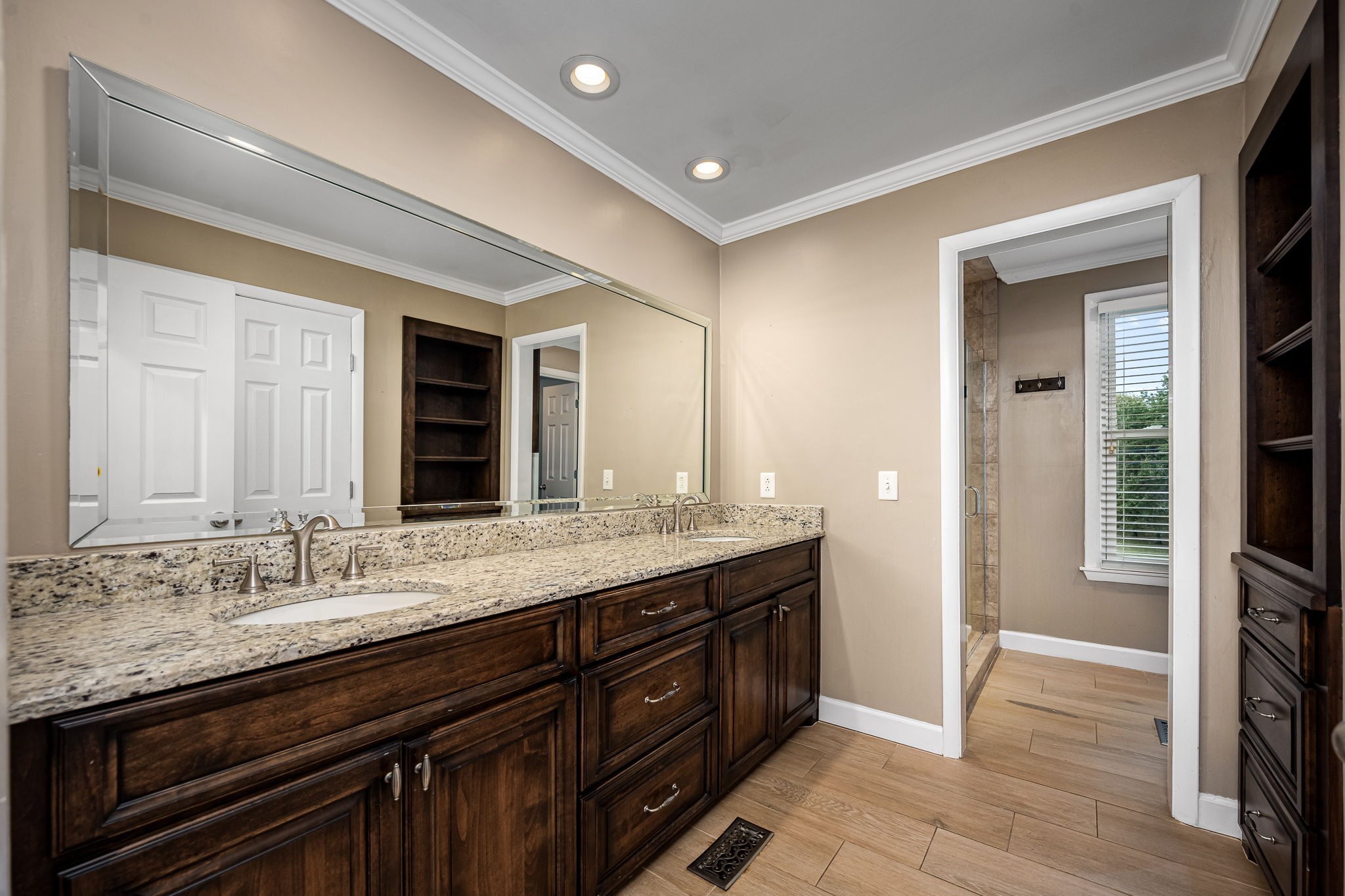 6580 Burkitt Road Antioch, TN 37013 - Photo 23 of 62 a bathroom with a granite countertop sink and a mirror